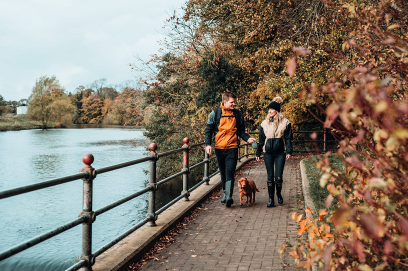 Couple walk alongside the River Tees at Broken Scar