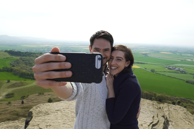 A couple take a selfie at the top of Roseberry Topping