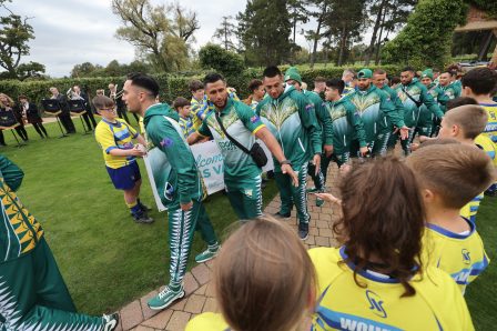 Cook Islands Rugby League World Cup squad arriving at Rockliffe Hall being greeted by youngsters from Yarm Wolves ARLFC