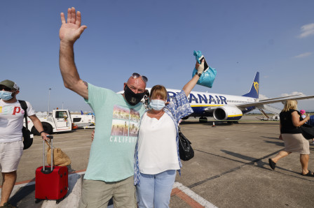 Passengers heading onto the first flight to Corfu